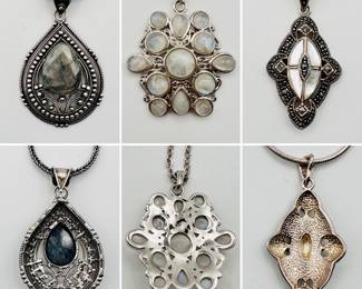 A sterling silver pendant necklace with natural stone, silver cord and beading; a sterling silver artisan crafted cabochon moonstone pendant necklace, and a sterling silver pendant necklace with marcasite and mother of pearl.