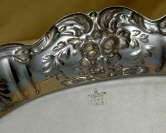 Closeup of sterling silver Reed & Barton Francis I oval bread tray, date stamp for 1951