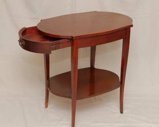 Another view of the pair of vintage MCM style tiered side tables