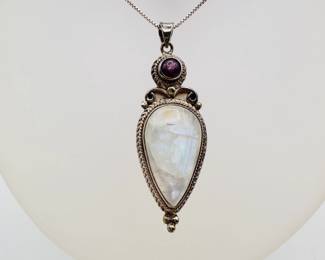 Another view of the cabochon moonstone and sterling silver pendant necklace
