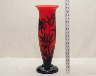 A beautiful and very tall (19 inches) cameo art glass footed vase by Loetz Art Glass, in mandarin red with black overlay skillfully carved in delicate flowering peonies design. Circa early 1920s and signed 'Richard' which was a line of art glass made by Loetz for the Edmond Etling boutique in Paris.