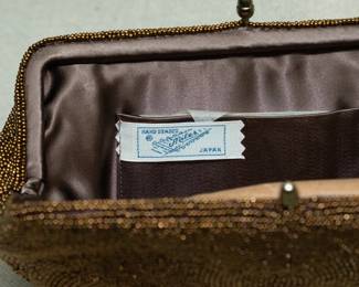 Closeup of vintage Miles Japan hand beaded clutch purse
