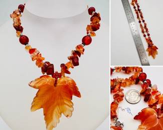 Carnelian or agate beaded necklace with large carved maple leaf; sterling silver clasp