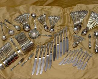 Sterling silver tableware by Reed & Barton in the 'Francis I' pattern, service for eight (with some extras); includes salad forks, dinner forks, dinner knives, butter knives, teaspoons, soup spoons, berry spoons, parfait spoons, demitasse spoons, serving spoons, sugar tongs, ice tongs, lemon forks, tea strainer, and more