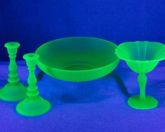 Seen under UV light: Vintage Tiffin-Franciscan Emerald Green Frosted uranium glass candlesticks, large bowl, and a #310 round compote