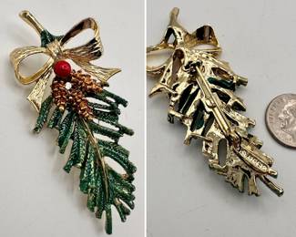 A GERRYS brooch for the winter holidays - enameled evergreen sprig with pinecones and red berry, with tied ribbon bow