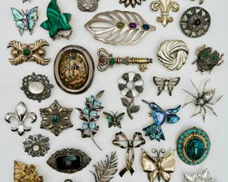 Such a selection of vintage pins, brooches, scarf rings — many of them sterling silver — wait til you see all the sweet jewelry available!