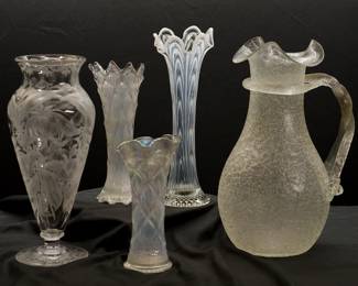 An American brilliant cut glass pedestal vase, signed Libbey; an opalescent glass Lattice & Points or funeral vase (possibly Dugan or Fenton), a vintage Fenton Art Glass Boggy Bayou French white opalescent reverse drapery swung vase, a Dugan white carnival glass Lattice & Points swung vase, and a rare Boston & Sandwich Glass Company blown overshot crackle clear glass pitcher with applied collar and handle, circa 1870-1888 (examples in Brooklyn Museum and Corning Glass Museum collections.)
