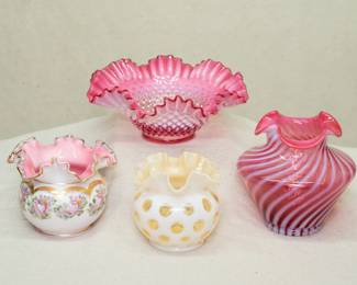 Vintage Fenton Glass 1950's Peach Crest 'Charleston' pattern rose bowl, ruffled crimped rim, hand painted with roses and gilt accents; a Fenton cranberry glass hobnail opalescent ruffled bowl, a vintage Fenton Honeysuckle opalescent coin dot ruffled vase, and a Fenton cranberry and opalescent optic spiral vase