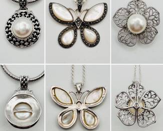 A sterling silver Mabe pearl pendant necklace, a sterling silver necklace with mother of pearl butterfly pendant, and a sterling silver blossom and Mabe pearl pendant necklace