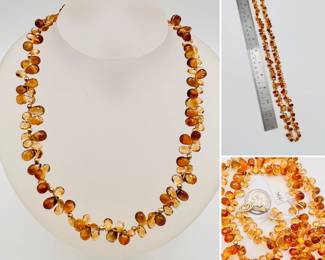 Necklace of faceted teardrop shape citrine beads with 14k gold clasp
