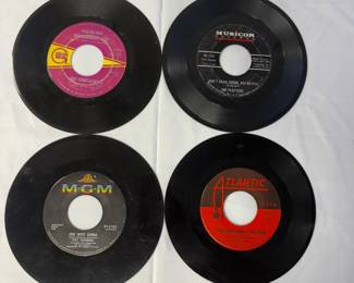 Vintage 45 records including You're Not An Ordinary Girl by The Temptations; One Note Samba by Pat Thomas; Don't Hear, Speak, See No Evil by The Platters, and I've Been Lonely Too Long by The Young Rascals