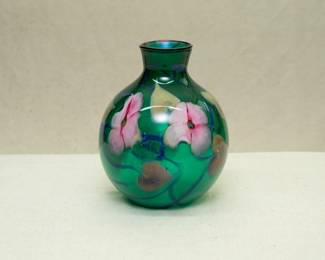 An early Charles Lotton art glass vase, green glass with a combination of his Multi Flora and Hearts and Vines decoration; signed and dated 1979.