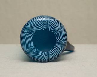 Base of the stunning art glass pitcher, blown glass in bright blue with white pulled into vertical ribs in a "drapery" or feathers design; applied dark blue handle
