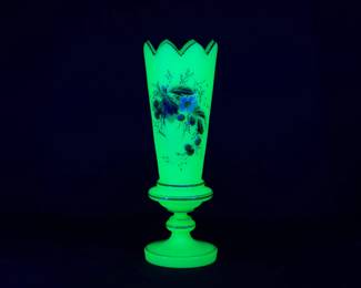 Seen under blacklight: Vintage green opaline art glass vase, uranium glass, possibly French; hand painted with floral sprays and gilding, and hand painted "8300" on the base.
