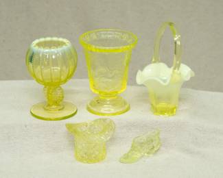 EAPG vaseline glass - Antique Northwood opalescent vaseline uranium glass ring pedestal beaded panel rose bowl, a small clear pedestal foot uranium glass vase with panels with stork in water scene and coin dot flared lip, a small clear to opalescent vaseline glass ruffled rim basket, a top hat shape uranium glass quilted pattern toothpick holder, and a wee uranium glass patterned lady's shoe