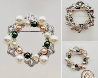 18k white gold brooch, circular frame set with diamonds, and various color natural pearls