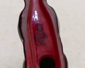 A Royal Doulton rabbit figurine, and a Royal Doulton flambé glaze rabbit figurine