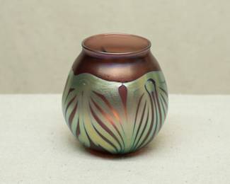 A Charles Lotton art glass vase, pulled feather design of iridescent gold green over a warm copper ground; signed and dated 1987.