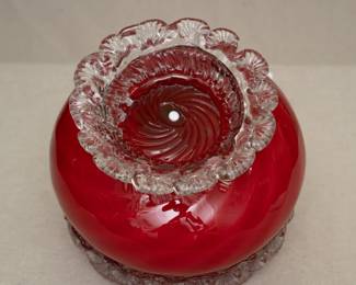 View of the base of the gorgeous antique art glass bowl – late 19th century cased cranberry glass with a subtle optic swirl, a band of clear glass rigaree shell pattern at the rim and clear glass swirled shell foot. Likely a Webb Glass or Stevens & William piece.