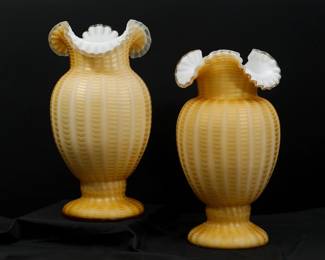 A rare, gorgeous —and large—pair of antique Stevens & Williams art glass vases, 15 inches tall, of pale honey gold "Zipper" mother of pearl (MOP) cased glass vases, with luminous vertical bands of pearlized dots from the round foot up to the rim, the mouth showing the inner white glass in a flared, crimped and ruffled rim.