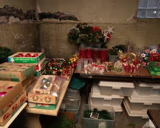 A LOT of Christmas / holiday decorations - boxes of Christmas ornaments, tree decorations including tinsel, containers of beaded strings; table top trees, and sleighs and reindeer figures, Santa figures, tree top stars, plastic poinsettia flowers and more