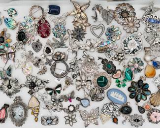 Just some of the sterling silver brooches and pendants available at this estate sale in Evanston!