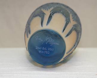 Closeup of the Pilgrim Glass parrots design cameo glass vase by artist Kelsey Murphy