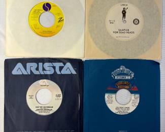 Vintage vinyl 45s including Just My Daydream by Aretha Franklin, and You Don't Know What You've Got by Joan Jett & The Blackhearts