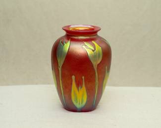 A glowing iridescent red and gold art glass vase by Charles Lotton (1935-2021), signed and dated 1992