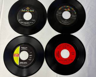 45s from Spyder Turner, Johnny Rivers, The Marvelows, and Simon & Garfunkel