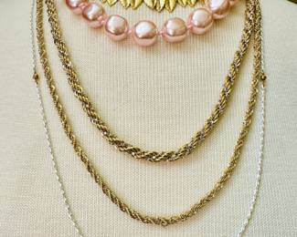 More from the selection of costume jewelry necklaces available. Shown here in descending order: Two from Napier, the rest from Monet
