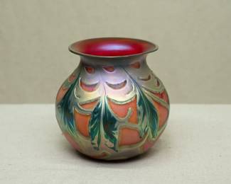 A signed 'Coral Leaf & Vine' art glass vase by Illinois artist Daniel Lotton, dated 1990