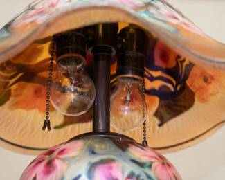 Another view of the beautiful hand made art glass lamp by American art glass master Charles Lotton (1935-2021), Illinois. This lamp shows Lotton's "Multi Flora" design, iridescent gold ground with a beautiful flower blossoms and leaves, and with original finial.