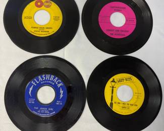 Vintage vinyl 45s from Stevie Wonder, The Five Satins, The Murmaids, and Curtis Lee