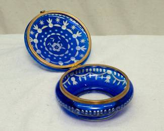 Open view of the Vintage Bohemian art glass round box with hinged lid, cut cobalt blue to clear glass in a stars and fruit decoration