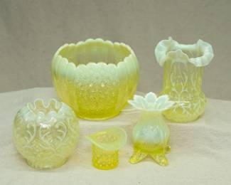 A Fenton 'Cape Cod' daisy & button opalescent vaseline glass/uranium glass rose bowl, a Northwood ruffled Spanish Lace topaz yellow opalescent vaseline glass vase or celery glass, an antique c. 1890 Northwood Spanish Lace opal brocade vaseline opalescent rose bowl, a Fenton Topaz hobnail opalescent uranium glass toothpick holder, and a Dugan Inverted Fan & Feather 'Lady's Spittoon' form Canary color opalescent vaseline glass vase