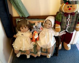 DOLLS ON BENCH