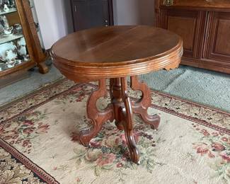 Antique Victorian Parlor Table, Ornate Carved Wood Round Top on Casters
