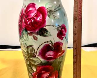 A large vintage Limoges porcelain vase hand painted with red roses