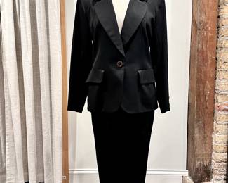 Vintage Yves Saint Laurent black wool suit, made in France; jacket size 10, skirt size 12