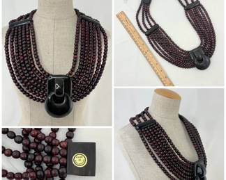 A beautiful vintage carved wooden beads and lacquered pendant necklace, made in the Philippines