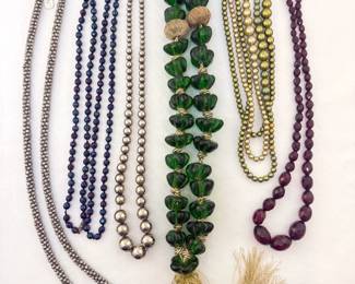 Get into the swing of it with some fresh vintage necklaces!