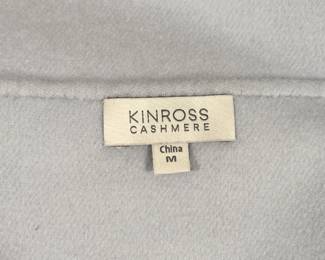Closeup of a Kinross Cashmere coat, pale gray, size M