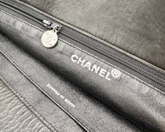 Closeup of Chanel Boutique black leather tote bag