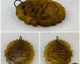 A carved hardstone pendant