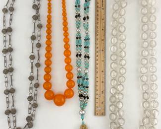 Cool vintage costume jewelry including lucite bead necklaces and delicate filigree metal necklaces