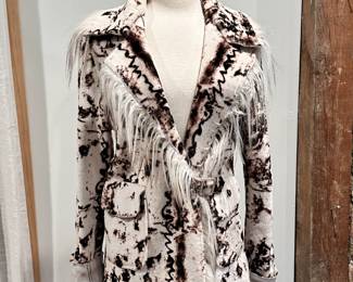 White leather brown patterned jacket/blazer, probably a size 10/12