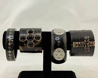 Dynamic black bracelets by designers including Victoria Marin, and Ted Rossi NYC