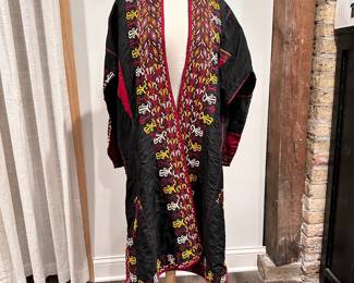 Rare vintage Turkmenistan embroidered silk tribal coat, handmade; black with red, white and yellow embroidered designs